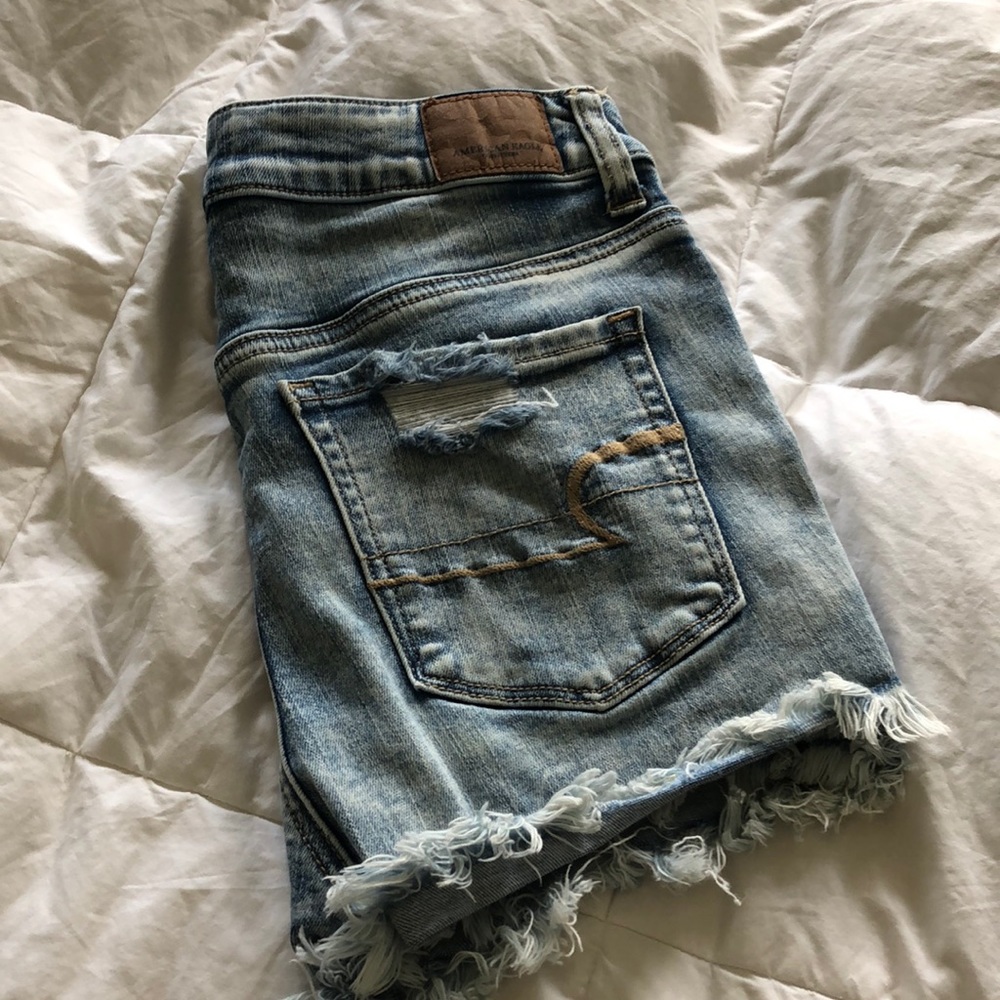 Distressed light wash jean shorts